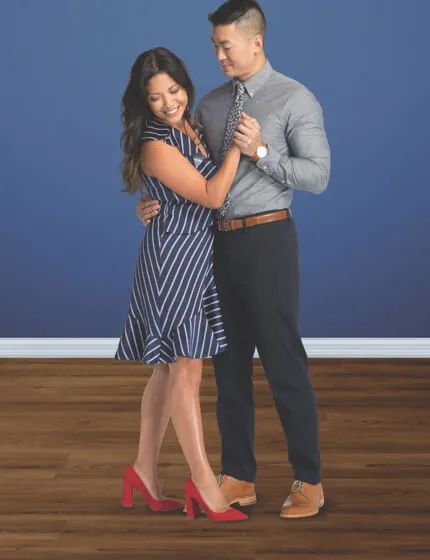 Happy Couple dancing on Luxury Vinyl | Boyer's Floor Covering